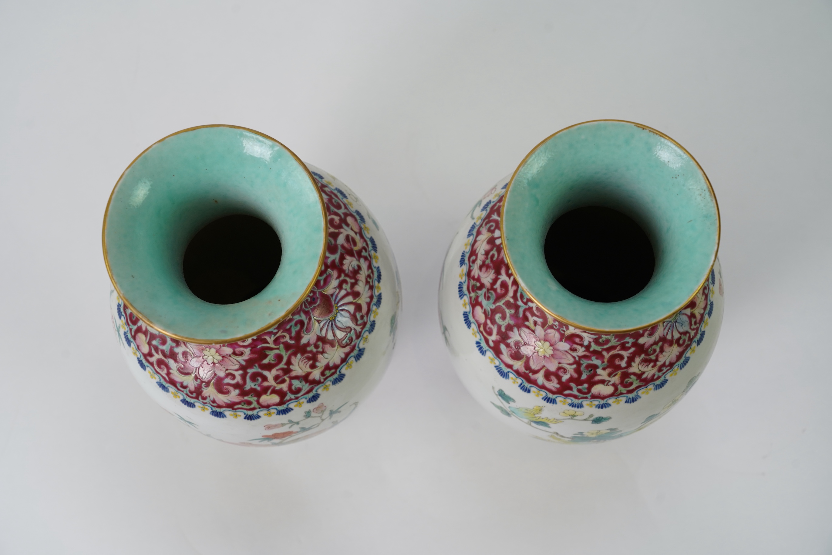 A pair of Chinese famille rose ‘sanduo’ vases, Qianlong seal mark, 19th century